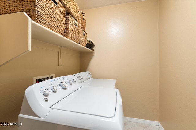 laundry room featuring washing machine and dryer