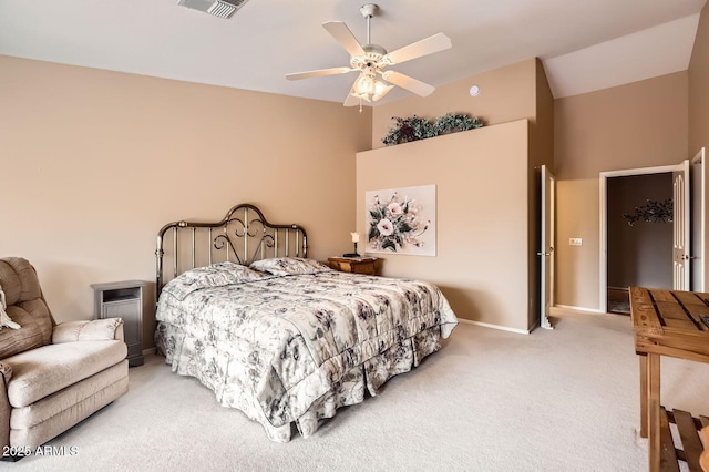 carpeted bedroom with visible vents, ceiling fan, and baseboards