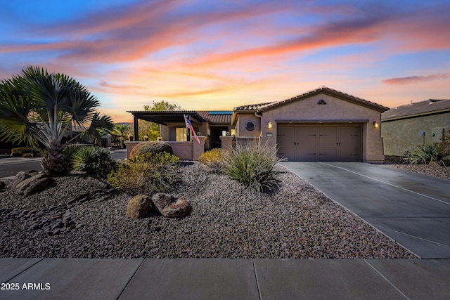 view of front of property with a garage