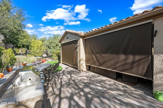 view of patio / terrace featuring an outdoor kitchen