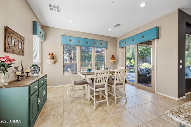 dining room featuring light tile patterned flooring