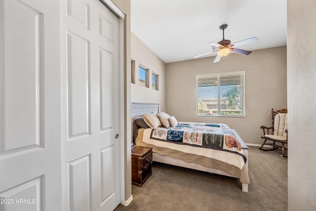 carpeted bedroom featuring ceiling fan