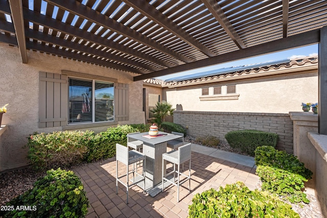 view of patio featuring a pergola