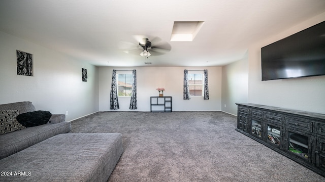 carpeted living room featuring ceiling fan