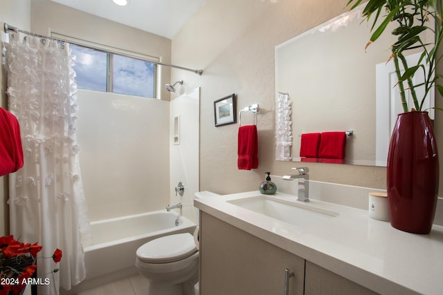 bathroom with toilet, a textured wall, shower / tub combo, and vanity