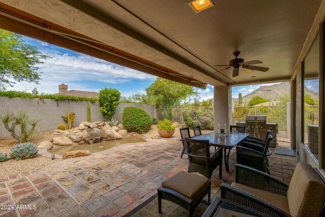 view of patio / terrace with ceiling fan