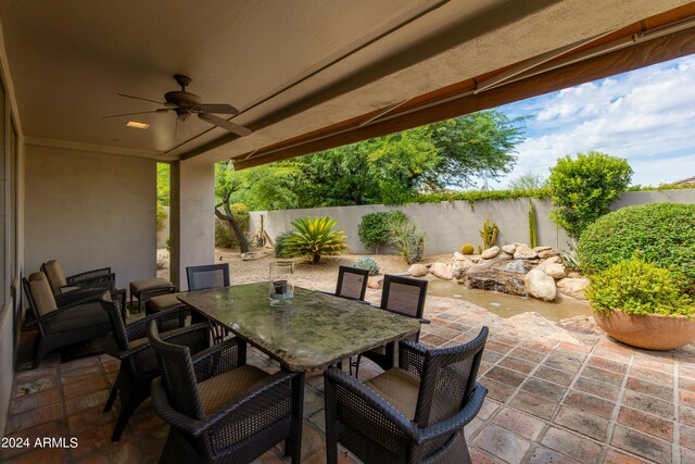 view of patio with ceiling fan