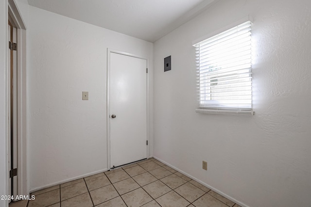 view of tiled spare room