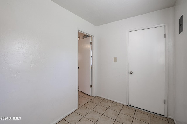 unfurnished bedroom featuring light tile patterned floors