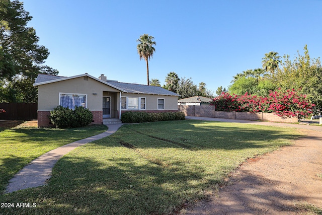 view of front of property with a front yard