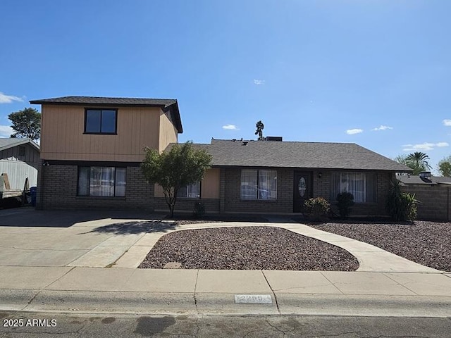 view of front of home with brick siding