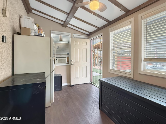 kitchen with white refrigerator, ceiling fan, cooling unit, dark hardwood / wood-style flooring, and lofted ceiling with beams