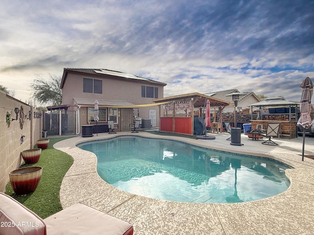 view of swimming pool featuring a patio area, a hot tub, and a pergola