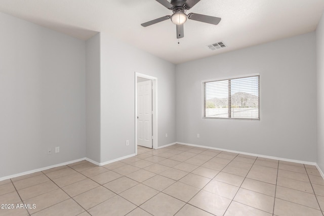 520 E Townley Ave, Phoenix, AZ 85020 - empty room with visible vents, baseboards, ceiling fan, and light tile patterned floors