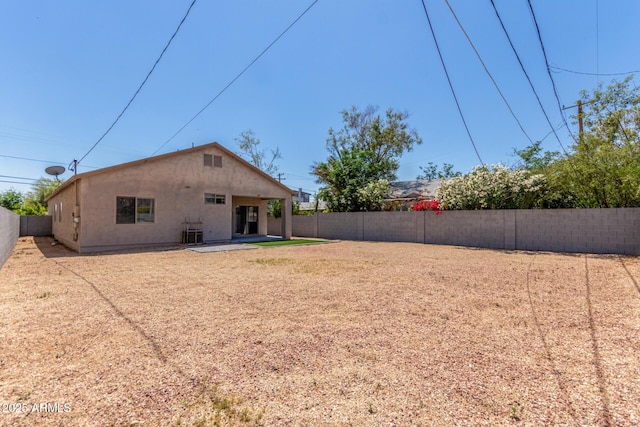 520 E Townley Ave, Phoenix, AZ 85020 - back of house with stucco siding, a patio area, and a fenced backyard