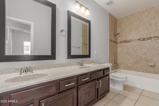 520 E Townley Ave, Phoenix, AZ 85020 - full bath with tile patterned flooring, visible vents, a sink, and toilet