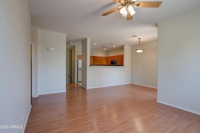 1335 E June St Unit 221, Mesa, AZ 85203 - unfurnished living room featuring light wood-style floors, a ceiling fan, baseboards, and recessed lighting