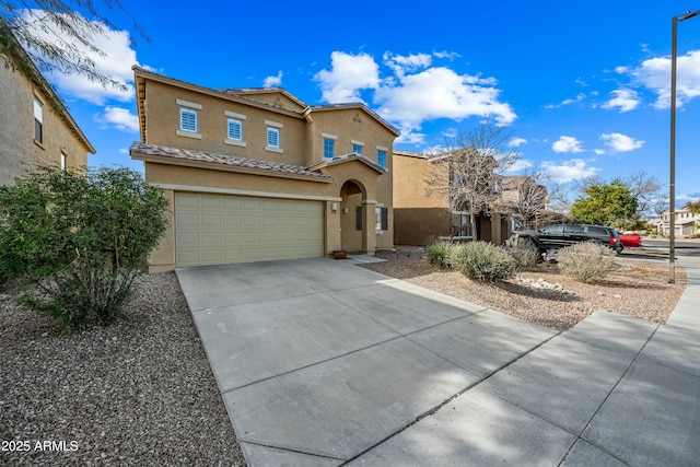 view of front of property with a garage