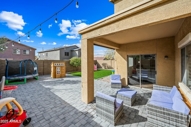 view of patio featuring an outdoor hangout area and a trampoline