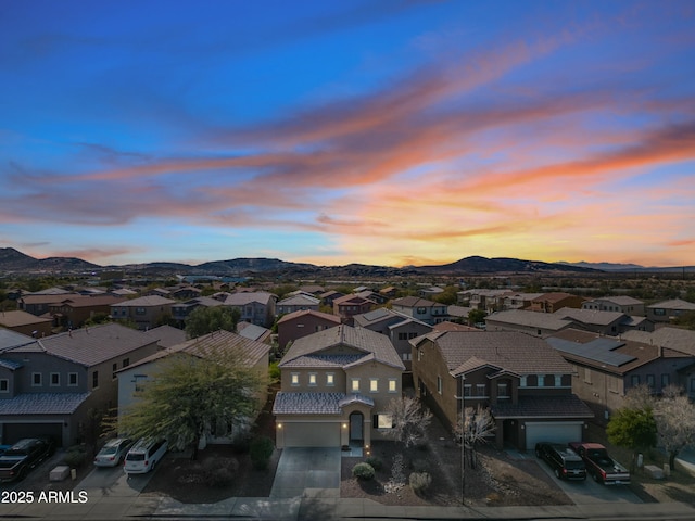 aerial view at dusk with a mountain view