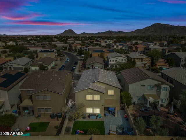 aerial view at dusk with a mountain view