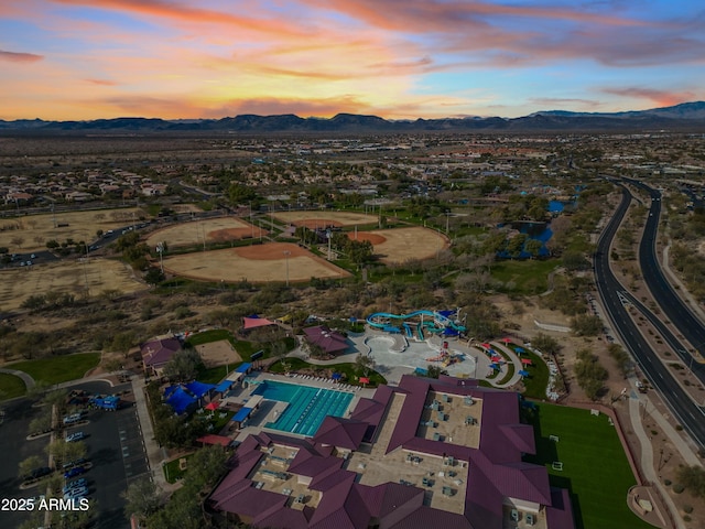 aerial view at dusk with a mountain view