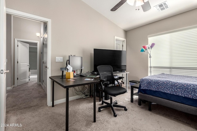 bedroom featuring lofted ceiling and light colored carpet