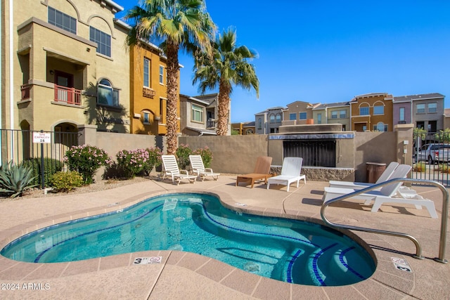 view of swimming pool featuring a patio