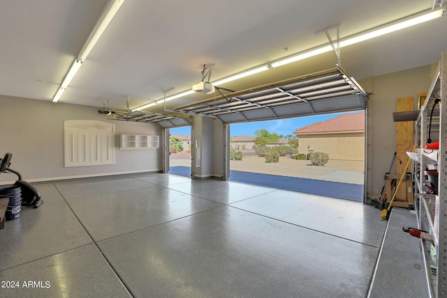 garage featuring a garage door opener