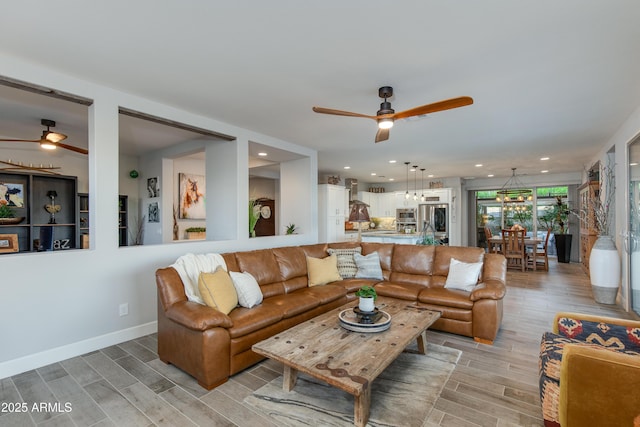 living room featuring wood finish floors, recessed lighting, and a ceiling fan