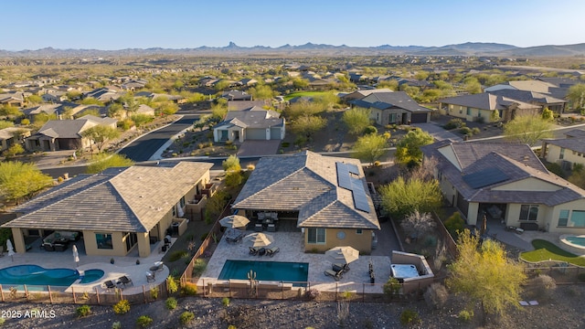 drone / aerial view with a mountain view and a residential view