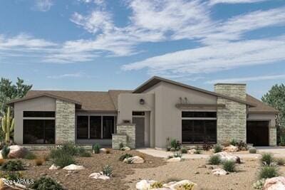 view of front of home with a garage