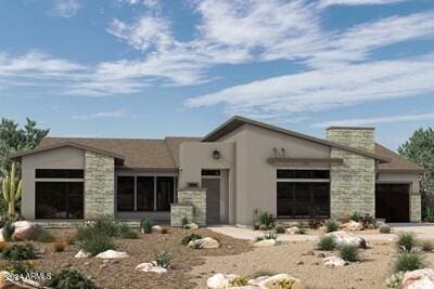 24450 N 132nd Pl, Scottsdale, AZ 85255 - rear view of property with a garage, driveway, stone siding, and stucco siding