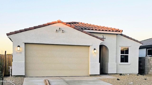 view of front of home with a garage