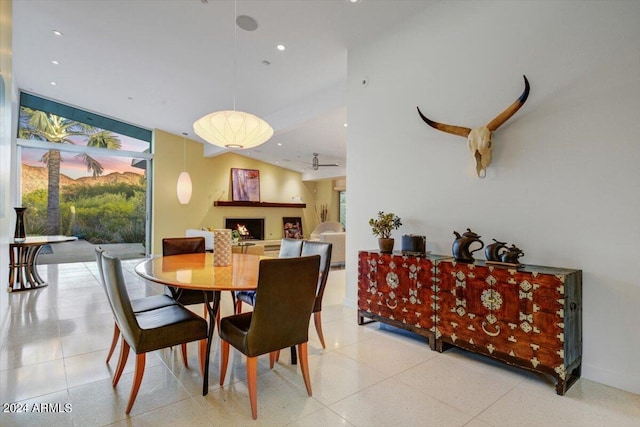 dining space with tile floors and a healthy amount of sunlight