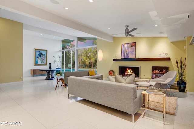 tiled living room with ceiling fan and beam ceiling