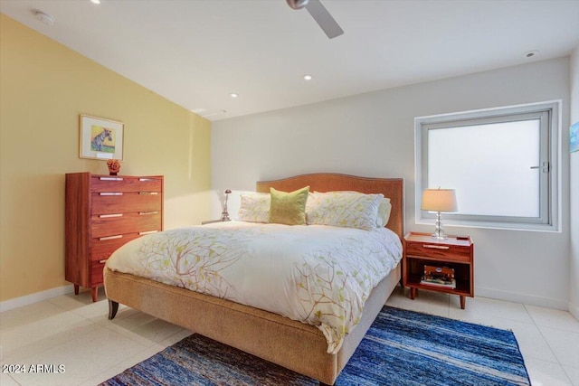 bedroom featuring tile floors and ceiling fan