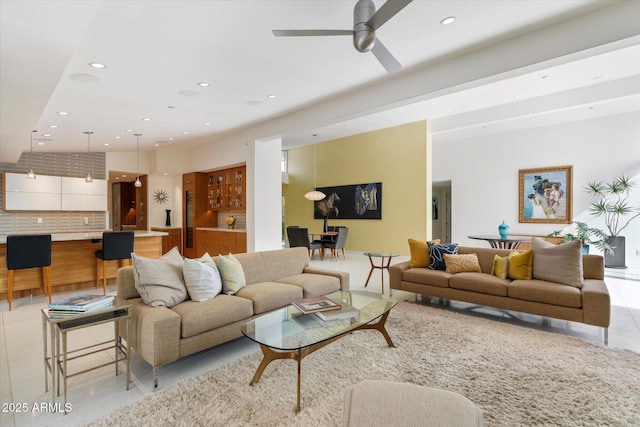 living room with ceiling fan