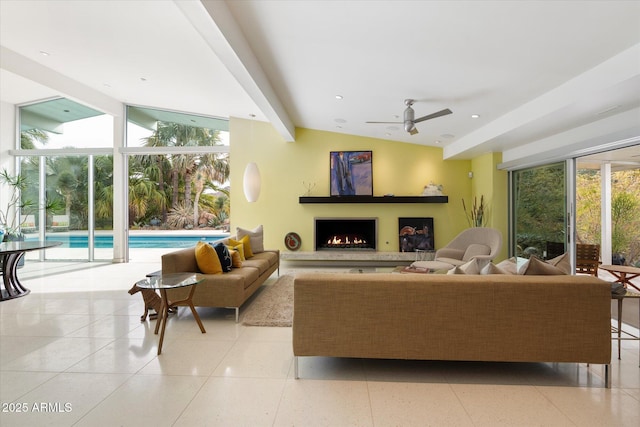 living room featuring ceiling fan, light tile patterned floors, vaulted ceiling with beams, and a healthy amount of sunlight