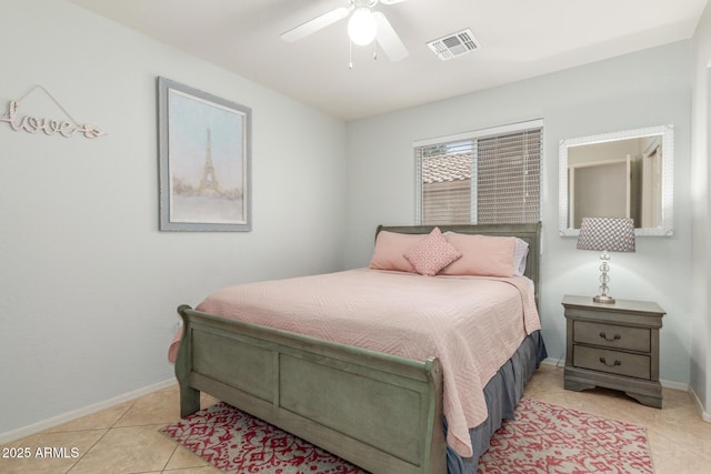 1142 E Mayfield Dr, San Tan Valley, AZ 85143 - bedroom with light tile patterned floors, baseboards, and a ceiling fan