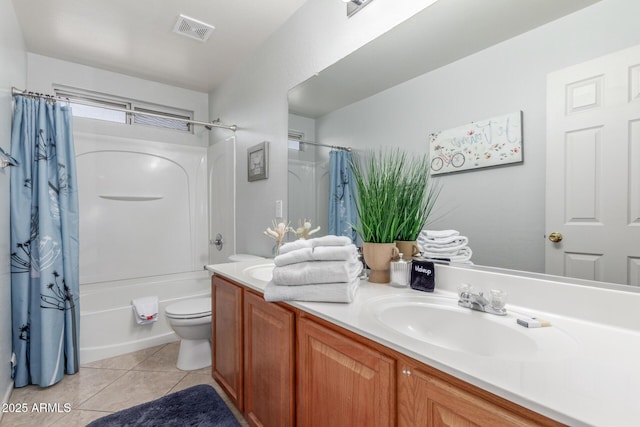 1142 E Mayfield Dr, San Tan Valley, AZ 85143 - bathroom with toilet, vanity, tile patterned floors, and shower / tub combo