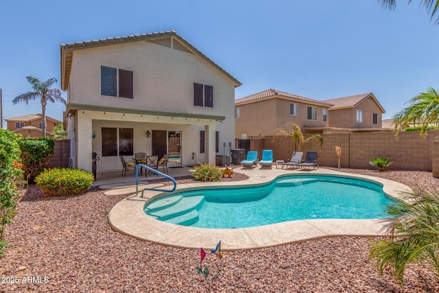 1142 E Mayfield Dr, San Tan Valley, AZ 85143 - view of swimming pool with a patio area and a fenced backyard