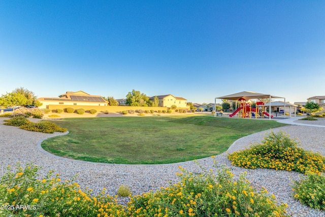1142 E Mayfield Dr, San Tan Valley, AZ 85143 - view of community with a lawn and a residential view