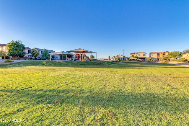 1142 E Mayfield Dr, San Tan Valley, AZ 85143 - view of green lawn with a residential view