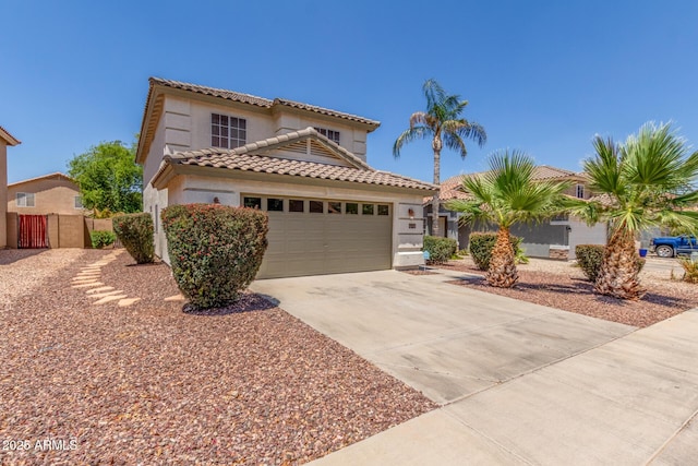 1142 E Mayfield Dr, San Tan Valley, AZ 85143 - mediterranean / spanish house with a tiled roof, a garage, driveway, and stucco siding