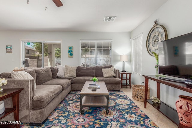 1142 E Mayfield Dr, San Tan Valley, AZ 85143 - living room featuring light tile patterned floors and ceiling fan