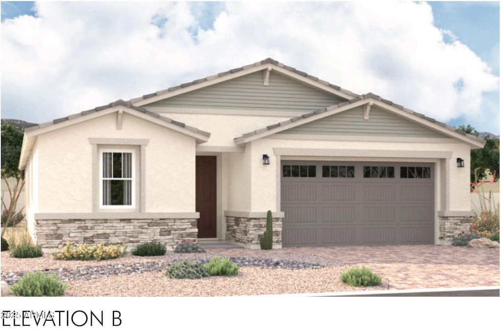 craftsman house with stone siding, stucco siding, a garage, and driveway