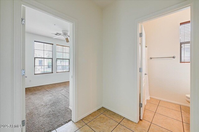 12775 W Lowden Rd, Peoria, AZ 85383 - hall featuring baseboards, light tile patterned floors, and light carpet
