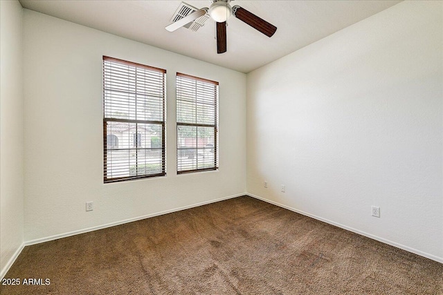 12775 W Lowden Rd, Peoria, AZ 85383 - unfurnished room with plenty of natural light, dark carpet, and baseboards