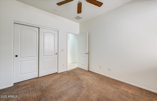 12775 W Lowden Rd, Peoria, AZ 85383 - unfurnished bedroom featuring carpet floors, a closet, baseboards, and ceiling fan